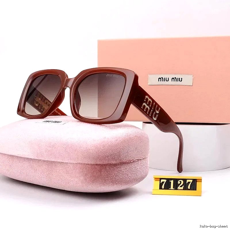 Miu Miu Summer Oversized sunglasses Black Oval Sunglasses with Bold Graphic